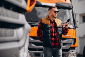 Handsome Man Truck Driver Standing By Truck Sorevo Ab